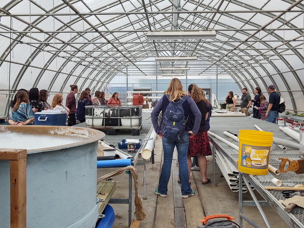 early release teachers in greenhouse