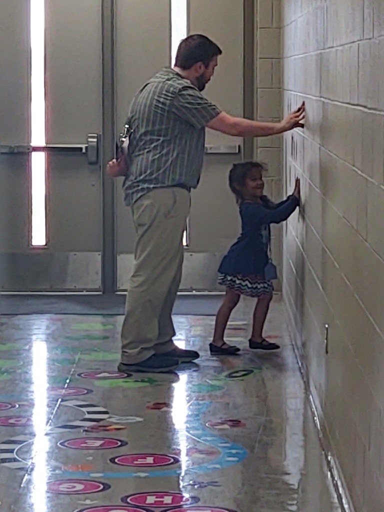 new student trying out the sensory floor with Mr. Liechty