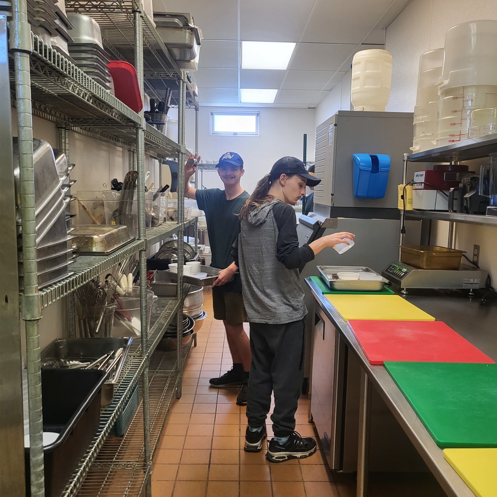 culinary students in kitchen